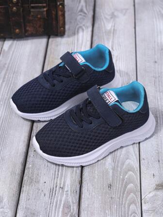 1 par vår/höst mode enkelt andas mesh EVA hög motståndskraft stötdämpande barn inomhus/utomhus Casual löparskor, lämpliga för pojkar/flickor