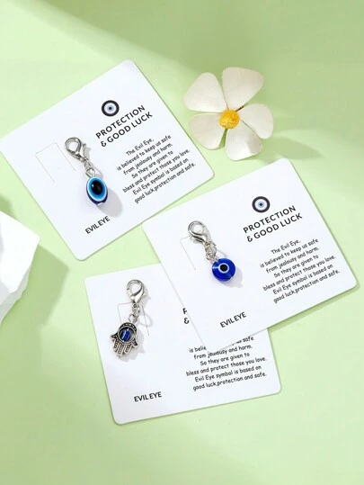 1 件锌合金邪眼吊坠带卡，神秘邪眼饰物，背包、手提包、钱包、钥匙的幸运符钥匙扣，独特的颜色组合和设计，适合朋友的礼物万圣节汽车配件包饰学校可爱哥特 Y2k 包配件挂绳带身份证夹汽车配件包饰
