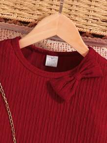 女童休闲舒适春秋连衣裙，针织纯色圆领盖袖领结长袖女童连衣裙，日常简约柔软透气百搭少女服装，户外青春优雅装