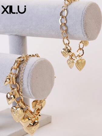 1 件心形小盒串珠手链，带多个元素，适合女士