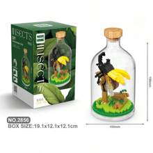 Un ensemble de décorations de bureau en blocs de construction créatifs, comprenant des papillons, des abeilles, des coccinelles, des coléoptères, des mantes, des libellules, des poulpes, des bernard-l'ermite, des poissons-globes, des blocs de construction d'hippocampes, des décorations pour la maison, des décorations créatives faites à la main et une décoration de salle de plantes en pot simulées
