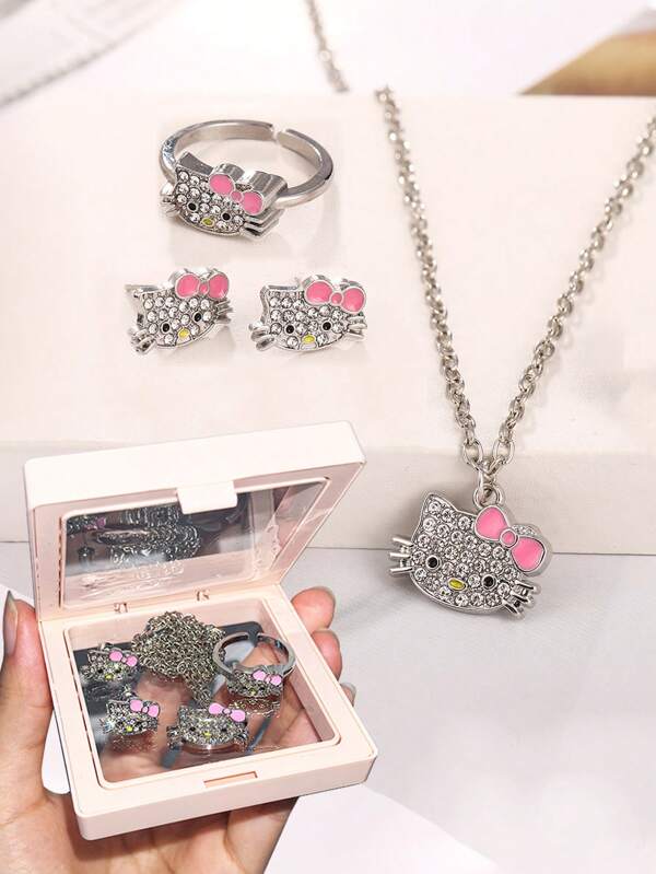 Sanrio Set 1 Juego de collar, anillo y aretes de Hello Kitty lindo con caja - Colgante de gato dulce - Regalos de cumpleaños y Navidad - Accesorios de joyería de dibujos animados (Algunas partes pueden ser al azar)