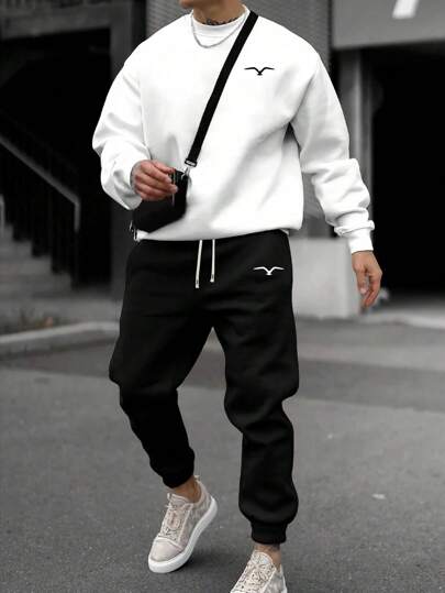 2pcs Fall Men's Sweatshirt And Sweatpants Set, White Long Sleeve Crewneck Casual Top, Knitted Elastic Waist Drawstring Black Joggers, Letter Graphic Printed, Cozy Outfits