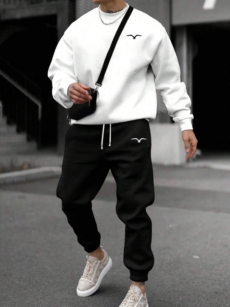 2pcs Fall Men's Sweatshirt And Sweatpants Set, White Long Sleeve Crewneck Casual Top, Knitted Elastic Waist Drawstring Black Joggers, Letter Graphic Printed, Cozy Outfits