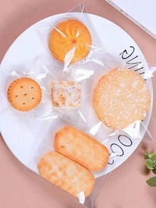 100 piezas Bolsas para galletas para empaquetar, bolsas individuales de celofán transparente y autosellantes para regalo, suministros escolares, alimentos, adecuadas para caramelos, chocolates, galletas, etc., suministros navideños - transparente - Ver 5