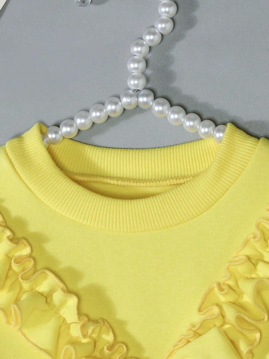 Young Girl Cute Long Sleeve Sweatshirt With Ruffle Hem And Bow Accent