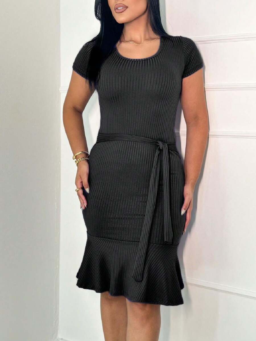 WOMEN'S EVANGELICAL RIBBED DRESS WITH RUFFLES AT THE HEM AND BOW DETAIL, MIDI - Black - View 1
