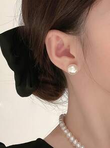 1 par de clips de oreja sin perforación magnéticos indoloros para mujer - Blanco - Ver 5