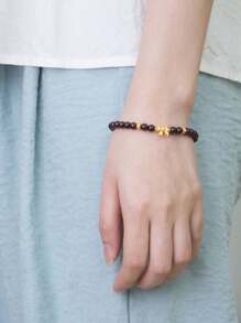 [VE] 1 件高品质纯银天然石榴石手链，提升整体气场，带来丰富的健康益处，促进血液循环，提升个人魅力。石榴石象征着幸福和忠诚，是送给亲人的理想礼物，传达真挚的情感，代表着像石榴一样丰富而甜蜜的生活。天然宝石颜色各异。 - 酒紅色 - 查看 2