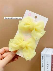 2 kẹp tóc nơ đính ngọc trai giả nhiều màu cho bé gái - Màu vàng - Xem 4