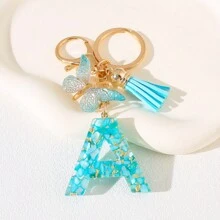 Llavero con letra del alfabeto en azul cielo con flecos de mariposa, llavero con inicial de piedra de resina con mosquetón - Accesorio decorativo de llavero para mujer, niña, mochila, colgante, accesorios para bolso, cordones con portaidentificación, accesorios para coche, encantos para bolso, regalo de Navidad, regalo para maestra, amiga, hermana - Multicolor - Ver 25