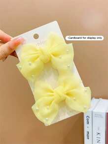 2 kẹp tóc nơ đính ngọc trai giả nhiều màu cho bé gái - Màu vàng - Xem 5