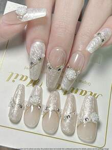 10pcs Handmade Press-On False Nails, Creative Coffin Shaped Artificial Nails, French Manicure Pull-String Nails, White Mother-Of-Pearl Textured French Simple Nails, With 3D Flower Pearl Diamond Bow Nail Decorations, Nude Nails, Coffin Nails, Fashionable Minimalist Colorful Nails, Cherry Blossom Nails, White Bow, White Nails, Pink Nails, Suitable For Spring, Summer, Autumn And Winter, European And American Style Nails, Cute Nail Decorations, Perfect For DIY Home Manicure, Office Daily Manicure, Gifts, Nail Art Supplies, Self-Learning Nail Art, Beginner Nail Art, Millennium Bug Style Nails, Fingernails, Nails, Upgraded Nails, Nail Art Set, Graduation Party Nails, Coffin Nail Tips, Almond Nail Tips, Nail Art Materials, Wedding Nails, Contrast Nails, New Style Nails, Birthday And Seasonal Gift Sets For Women And Girls! - White - View 2