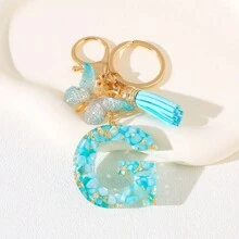 Llavero con letra del alfabeto en azul cielo con flecos de mariposa, llavero con inicial de piedra de resina con mosquetón - Accesorio decorativo de llavero para mujer, niña, mochila, colgante, accesorios para bolso, cordones con portaidentificación, accesorios para coche, encantos para bolso, regalo de Navidad, regalo para maestra, amiga, hermana - Multicolor - Ver 27