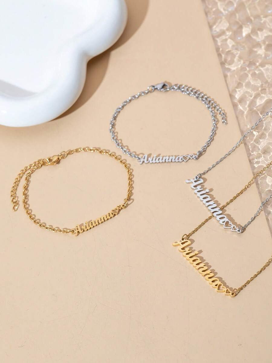Bộ dây chuyền và vòng tay khắc tên hình trái tim tối giản cá nhân hóa, trang sức đôi bằng thép không gỉ, món quà hoàn hảo cho Giáng sinh, Halloween, Ngày Valentine, Kỷ niệm - Dành cho các cặp đôi, Mẹ, Bố. Phong cách, Thời trang mùa thu, Cổ điển, Tối giản, Đơn giản, Thường ngày, Unisex, Cổ điển, Cá nhân hóa, Độc đáo. Món quà lý tưởng dành cho Anh ấy, Bạn gái, Mẹ, Gia đình, Bạn bè, Người yêu, Bạn trai, Bố, Con trai, Con gái. Dành cho Kỷ niệm, Sinh nhật, Đeo hàng ngày, Dạ hội, Ngày của Mẹ, Ngày Valentine, Lễ tốt nghiệp, Đám cưới, Ngày của Cha. Dây chuyền chữ thời trang tùy chỉnh, Vẻ ngoài quyến rũ, Vẻ quyến rũ năm mới, Trang sức dành cho Phụ nữ. - Bạc - Xem 1