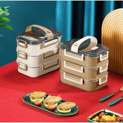 Cutie Bento cu design nou, cu mâner și încuietoare pătrată, special concepută pentru studenți, recipient alimentar pătrat multistrat, fabricat din oțel inoxidabil 304 pentru siguranța și igiena alimentară. Design portabil cu mâner robust pentru transport ușor. Sistem unic de etanșare cu încuietoare pătrată, previne eficient scurgerile.