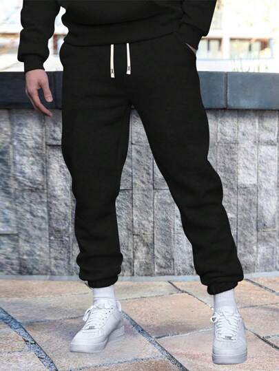 男式常规款纯色休闲裤，基本款，带口袋和松紧腰带，春夏