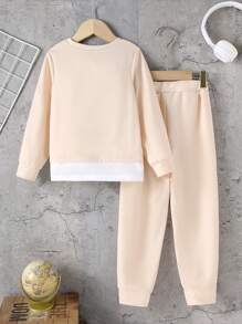 2 pièces/set Ensemble 2 en 1 de pull col rond et pantalon en couleur unie avec détail brodé, style décontracté pour filles, automne/hiver