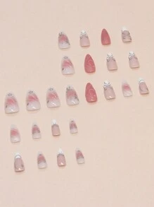 独特的粉色杏仁形压花指甲，3D蝴蝶结和星星装饰，亮面处理，短款，适合女士和女孩。短款精美压花指甲，短款水晶指甲，搭配配饰，美甲用品，美甲