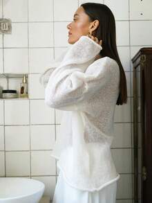 女士宽松镂空长袖白色毛衣上衣，新年白色装扮