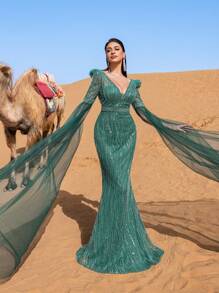 Faeriesty Đầm dạ hội trang trọng thanh lịch dành cho nữ với cổ chữ V sâu, tay áo dài chấm đất trong suốt ấn tượng và kiểu dáng đuôi cá tôn dáng. Được thiết kế cho các buổi dạ tiệc trang trọng, lễ trao giải, sự kiện từ thiện quan trọng, tiệc cưới và các buổi tiệc chiêu đãi sang trọng. - Màu xanh lá cây đậm - Xem 7