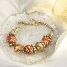 1 szt. Urocza emaliowana, słodka pomarańczowa dynia z kryształkami bransoletka z koralików dla kobiet na Halloween, dekoracyjna bransoletka z akcesoriami do biżuterii - Pomarańczowy - Zobacz 3