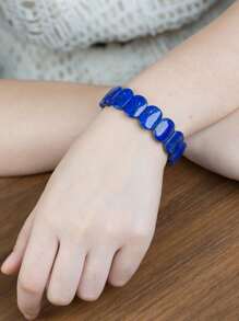 [VE] 1 chiếc Vòng tay Lapis Lazuli tự nhiên chất lượng cao, mô tả bầu trời đêm yên tĩnh, tượng trưng cho trí tuệ và sự chiêm nghiệm. Mỗi viên đá quý được sắp xếp tỉ mỉ, thể hiện gu thẩm mỹ độc đáo của người đeo và truyền tải thông điệp về sự thanh thản và bình yên nội tâm, một vật phẩm tuyệt vời để cân bằng cơ thể và tâm trí, cũng như truyền cảm hứng sáng tạo. Màu sắc của đá quý tự nhiên có thể thay đổi. - Màu xanh lam - Xem 2