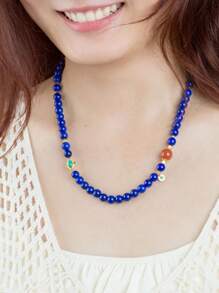 VE [VE] 1 pièce de collier de perles de lapis-lazuli naturel de haute qualité en argent, décoré de cornaline et de turquoise. Chaque pierre présente une apparence majestueuse comme le ciel nocturne, symbolisant la sagesse et la sérénité. Le port de ce collier ajoute non seulement une touche de mystère, mais inspire également la paix intérieure et la force, mettant en valeur votre charme et votre goût uniques. Les couleurs des pierres précieuses naturelles sont sélectionnées de manière aléatoire.