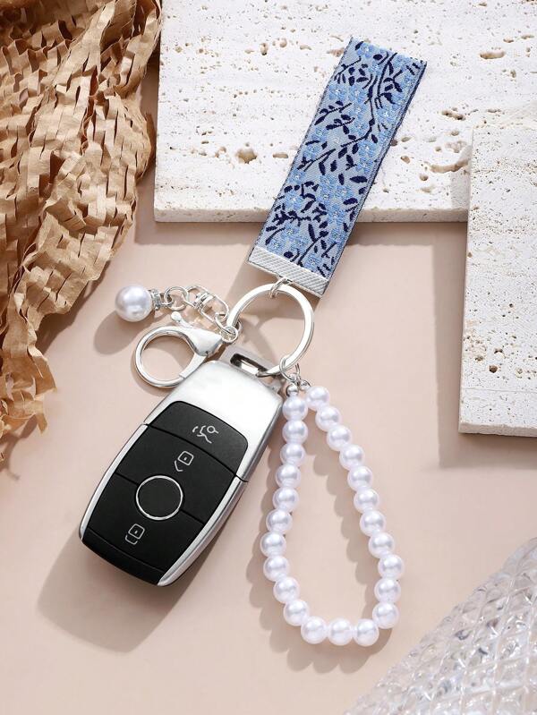 1 pièce Porte-clés avec perle artificielle avec sangle brodée bleue et motif fleuri (Remarque : la sangle n'est pas à la main, mais la chaîne de perles est élastique et peut être tenue à la main), Porte-clés à pendentif élégant pour sac de femme, Porte-clés ruban mode femme, Porte-clés universel, Porte-clés de voiture, Porte-clés mode femme (Une légère différence de couleur peut exister en raison de l'éclairage pendant la photographie, l'article réel prévaut)