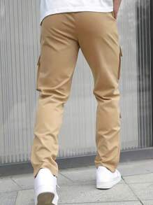 Pantalones cargo rectos de unicolor con cordón y bolsillos para hombre