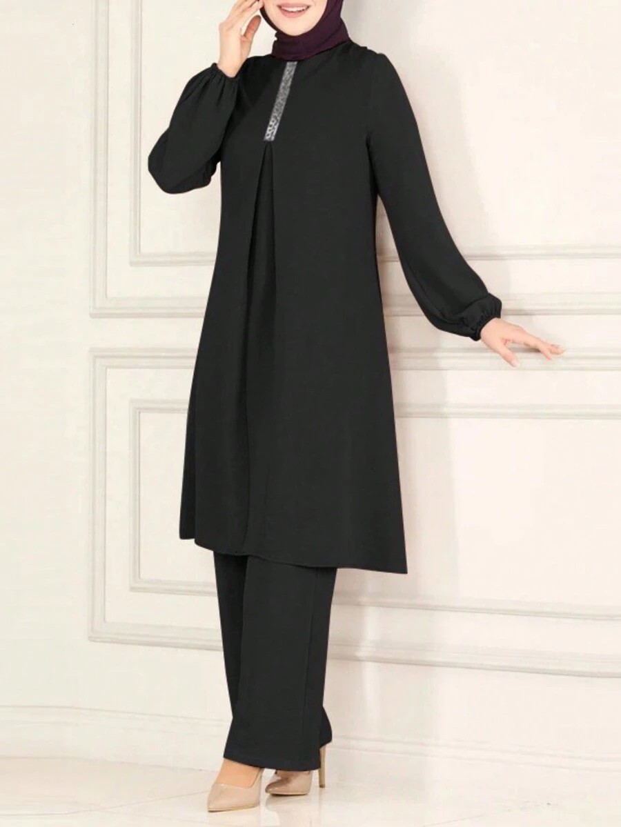 女士休闲纯色圆领衬衫上衣搭配宽松长裤两件套，优雅风格