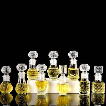 1 قطعة زجاجة قديمة منقسمة، زجاجة زجاجية شفافة فارغة قابلة لإعادة التعبئة لديكور المنزل والطاولة، زجاجات صغيرة شفافة إبداعية منقوشة لنقل السوائل العطرية والسفر (متوفرة بحجم 50 مل/1.69 أونصة و 100 مل/3.38 أونصة) ، زجاجة عطر