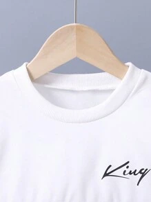 Sudadera de cuello redondo con bloques de color e impresión de letras y pantalones deportivos informales para niños preadolescentes