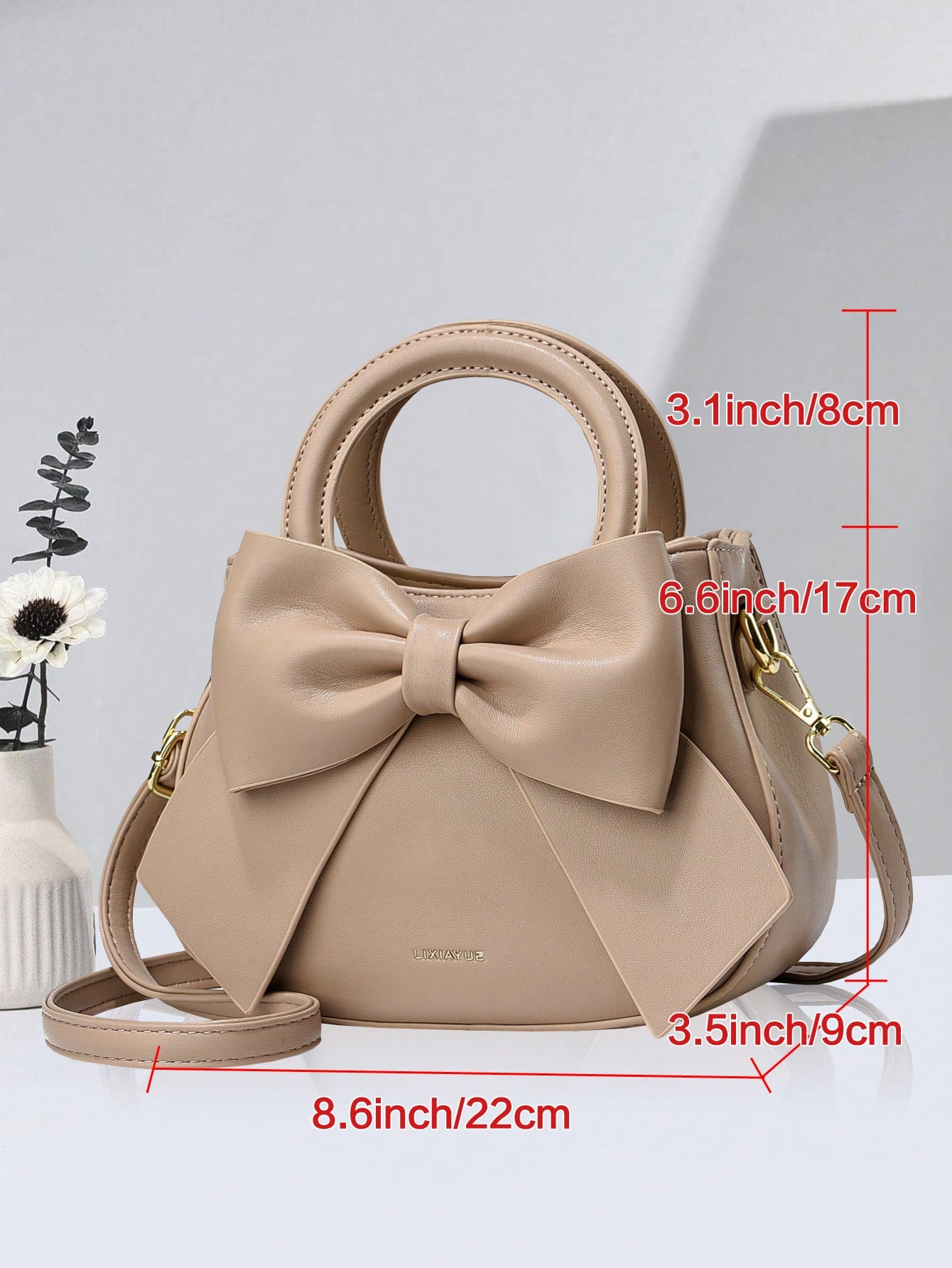 حقيبة يد نسائية كلاسيكية – لون واحد مع فيونكة أنيق...