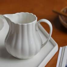 Jarra de porcelana pequeña nueva de perla iridiscente en existencia, jarra de leche cerámica, envase de leche creativo