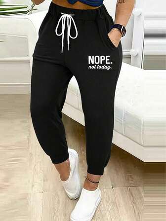 休闲字母印花抽绳斜口袋袖口运动裤