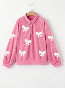 Sweatshirt à manches tombantes avec demi-boutons, nœud papillon et séquins