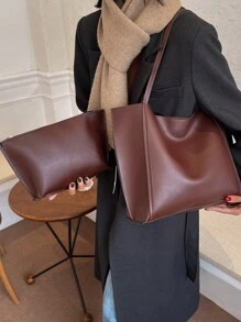 两件套纯色大容量单肩手提包和手拿包，采用PU皮革材质，适合女孩和女士日常使用、工作和购物。