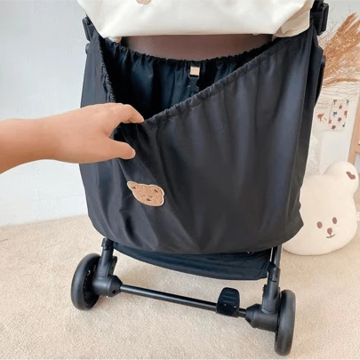 A Waterproof Bear-Themed Stroller Storage Bag For Convenient Outings