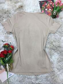 Camiseta com strass em forma de estrelas. Único 36 ao 44
