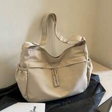 New Women's Canvas Bag, Large Capacity Tote Bag, High-End Feel, Underarm Bag, New Makeup Bag, Niche Crossbody Bag The Shoulder Bag