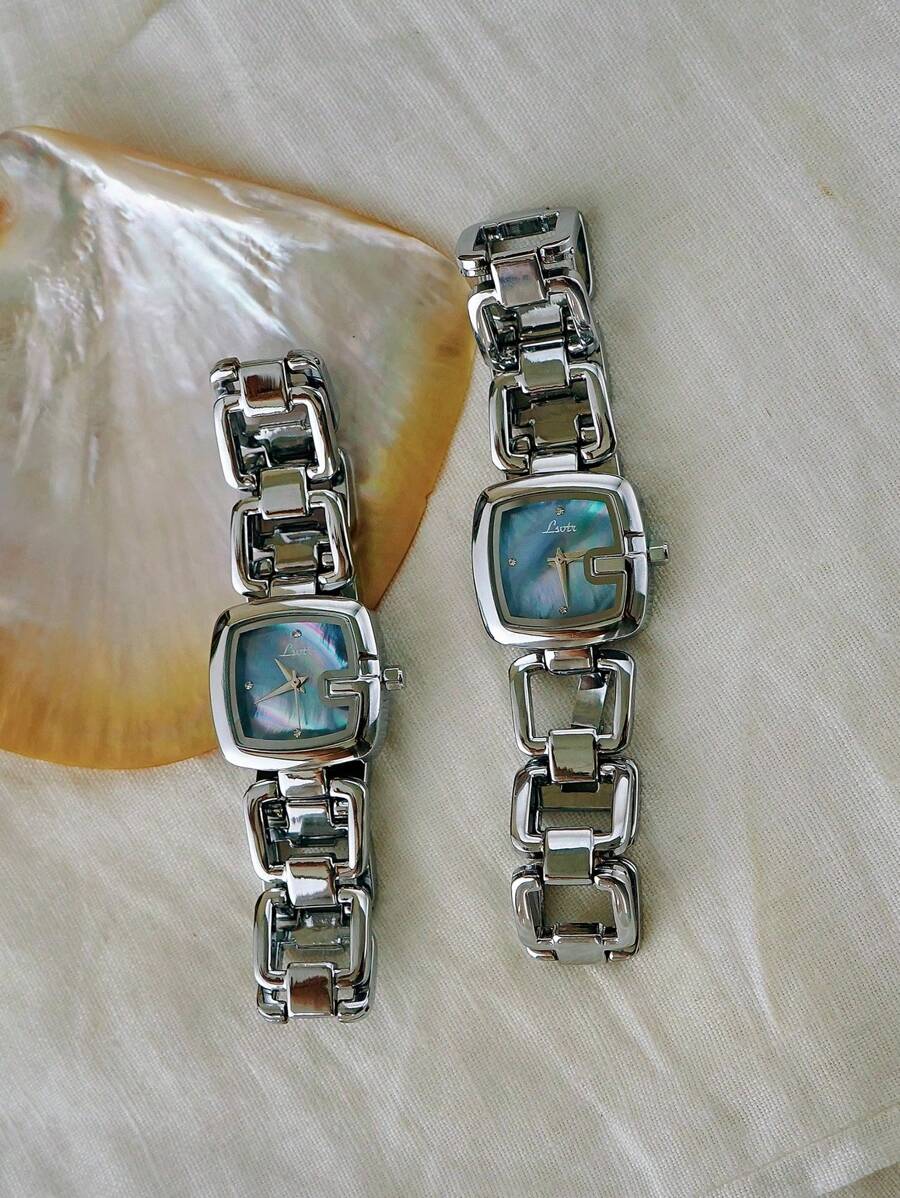 1pc Elegant & Women's Quartz Watch, Silver-Tone Stainless Steel Strap, Rhinestone Decor, Mother-Of-Pearl Dial, Hollow Design, Suitable For Casual, Party, Gift - Silver - View 1