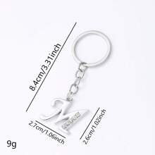 1 pièce Porte-clés pendentif en métal avec 26 lettres strass, style coréen minimaliste. Porte-clés de voiture, accessoire de sac à la mode, petit cadeau, cadeau pour elle, cadeau pour femme