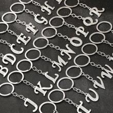 1 pièce Porte-clés pendentif en métal avec 26 lettres strass, style coréen minimaliste. Porte-clés de voiture, accessoire de sac à la mode, petit cadeau, cadeau pour elle, cadeau pour femme