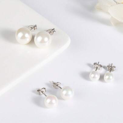 1 对 S925 纯银淡水优质珍珠耳钉，简约小巧优雅的设计，是送给女性、女友、婚礼、珠宝节的奢华女性礼物