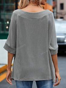Blouse avec manches chauve-souris à cordonnet, encolure bateau avec motif rugby pailleté
