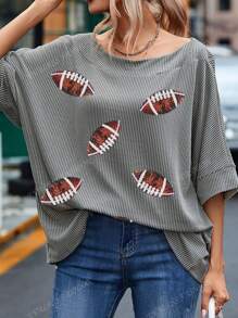 Blouse avec manches chauve-souris à cordonnet, encolure bateau avec motif rugby pailleté