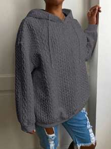 Sweat-shirt à capuche à manches longues ample et décontracté en tricot jacquard de couleur unie pour femmes grandes tailles