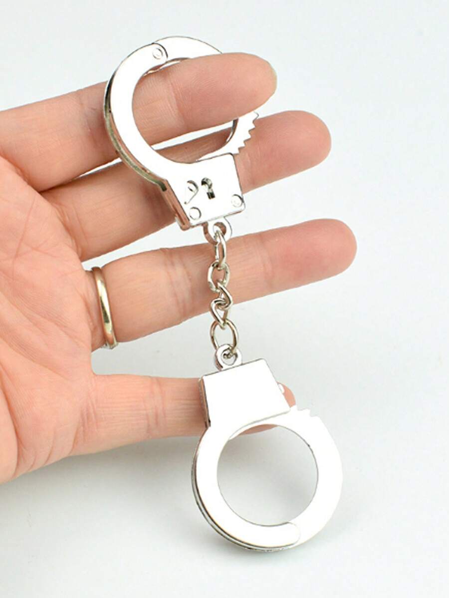 1 pièce Porte-clés personnalisé en forme de menottes, accessoire de sac simple, adapté comme cadeau pour les amis. Petit accessoire de porte-clés