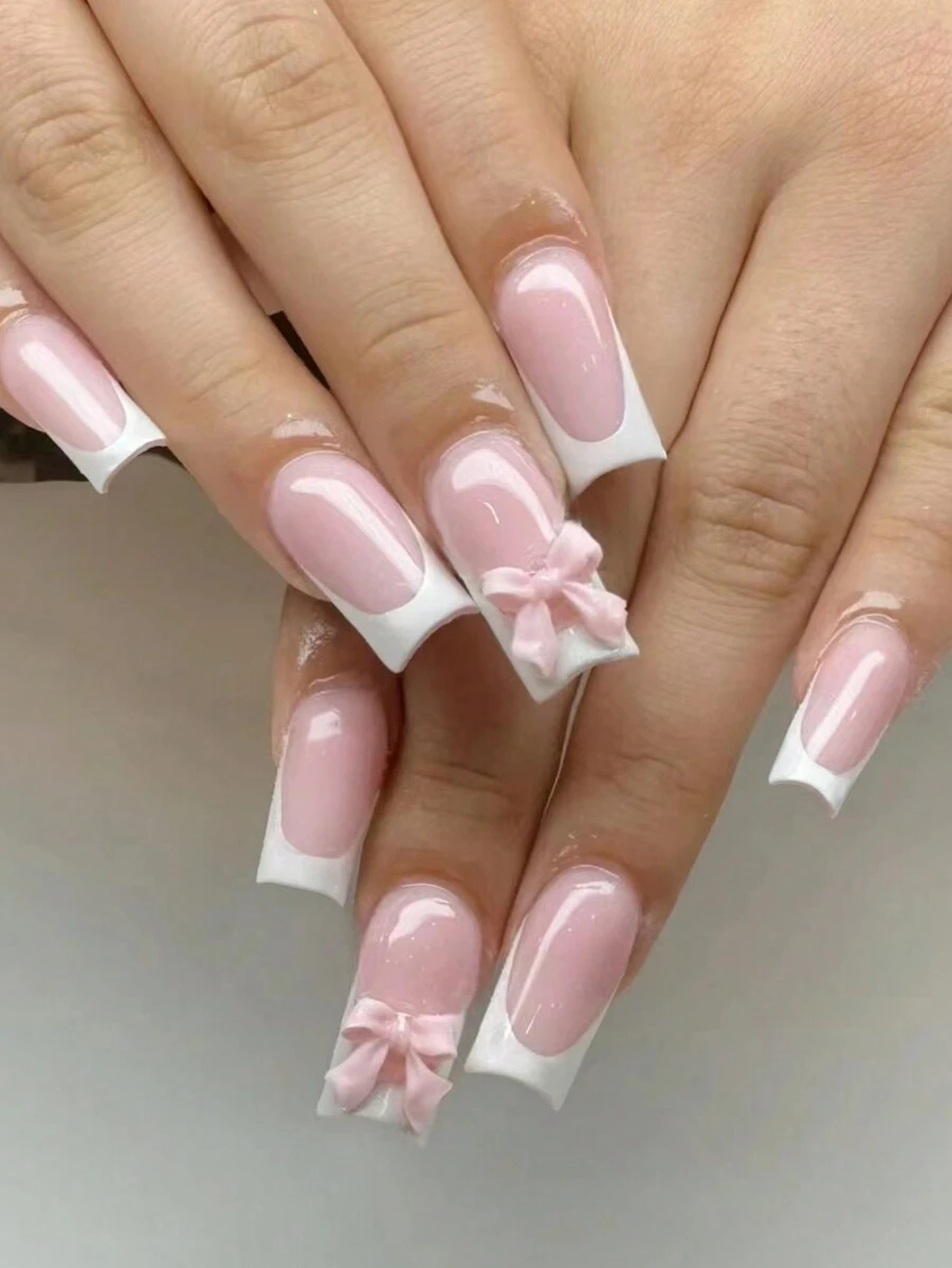 使用美甲用品升级您的外观，24 件方形短假指甲法式指甲，带 3D 粉色蝴蝶结装饰，包括 1 片粘性标签和 1 件迷你锉刀，经典粉色和白色法式全覆盖假指甲套装，适合女性和时尚女孩日常佩戴的美甲。这款短指甲永不过时。按压指甲 - 彩色 - 查看 1